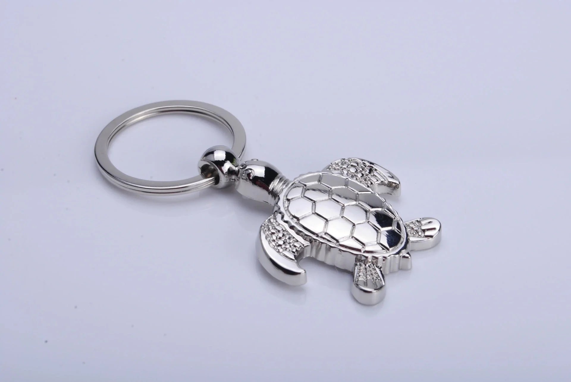 Silver zinc alloy animal shape pendant keychain on a keyring