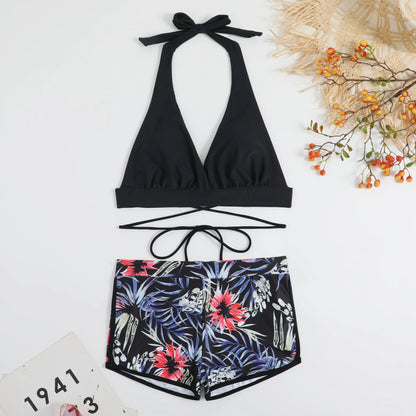 High waist split bikini in peacock green, red, or black, nylon outer with polyester lining, sizes S to XL