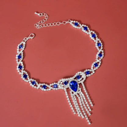 Blue rhinestone tassel anklet with gold-plated accents, perfect for women's fashion accessories.