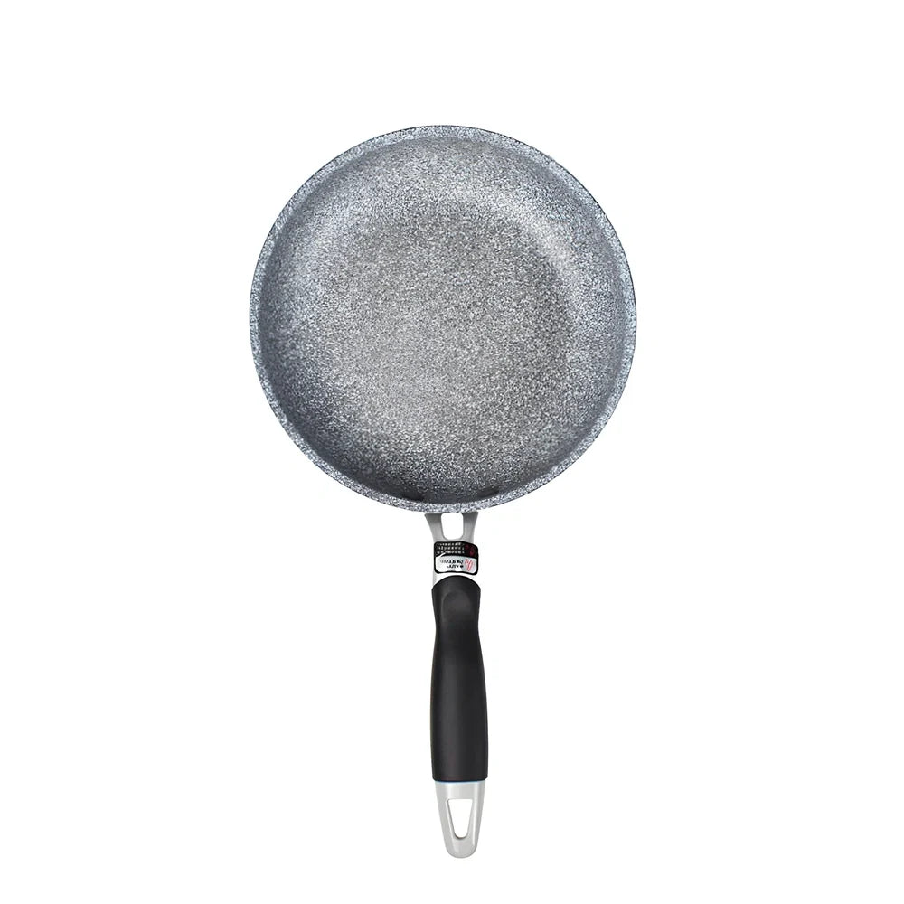 Japanese-style Maifan stone frying pan with glass lid showing non-stick surface and compound bottom