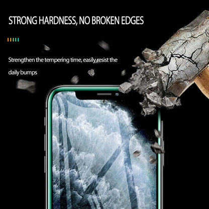 Luminous tempered glass screen protector glowing in dark next to iPhone