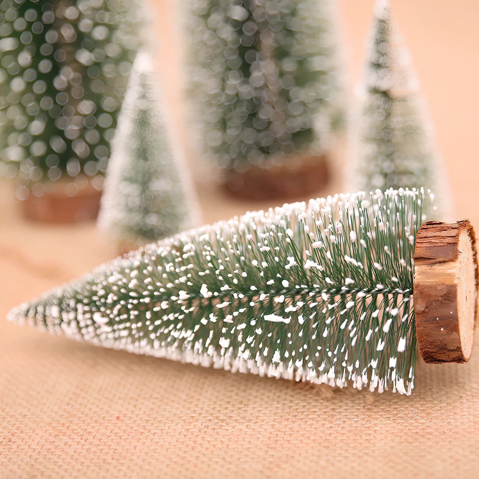 Green and white Christmas pine needle tree decoration in four height options