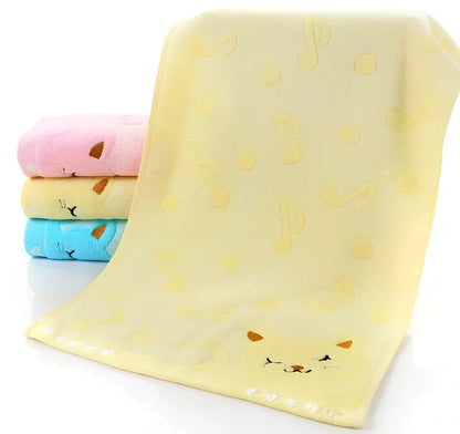 Bamboo fibre bath towel with kitten face pattern measuring 25x50cm in blue, green, pink or yellow