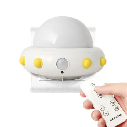 Remote control UFO bedside night light in blue, pink, or white colours with compact 105mm x 76mm dimensions
