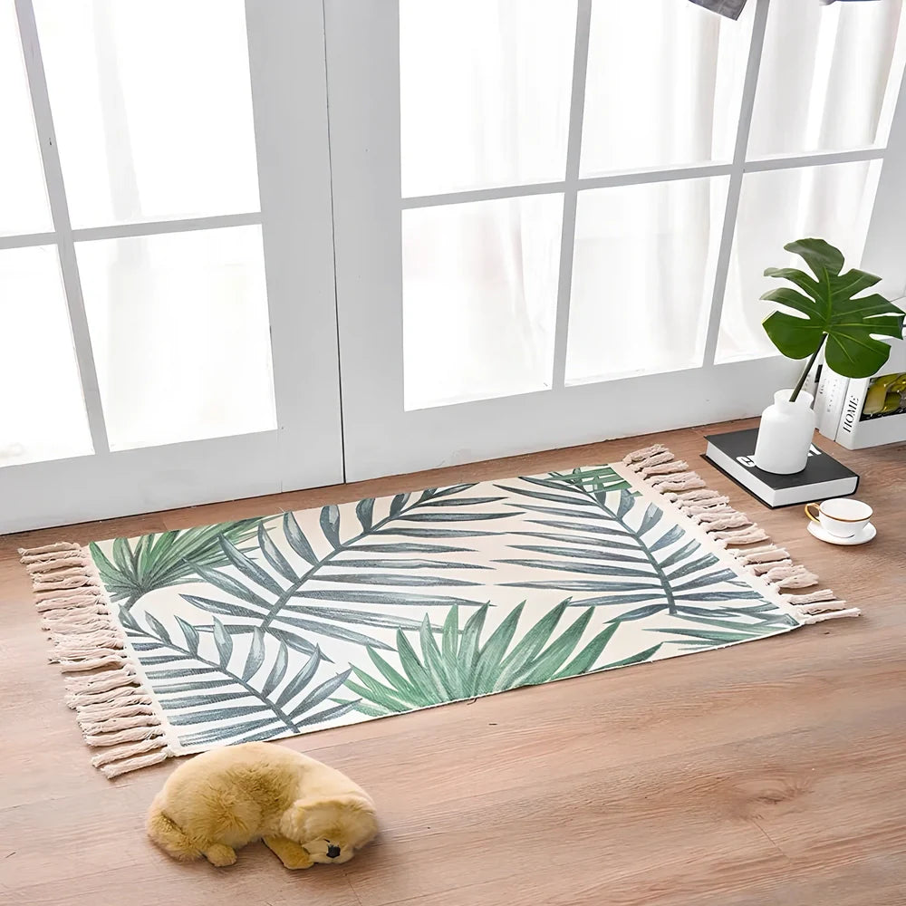 Hand-woven Scandinavian style linen cotton rug with woven tassels in plant-dyed colours measuring 60x90cm