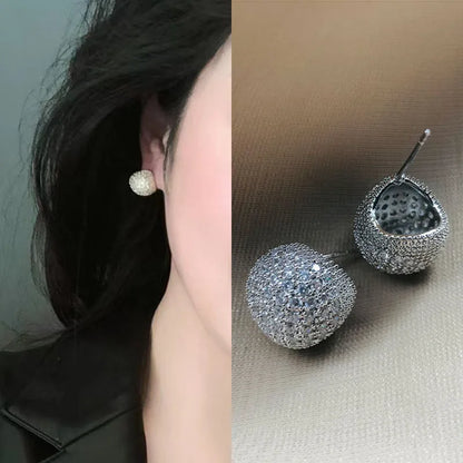 Geometric drop-shaped ear clips with full diamond design in gold or white colour options