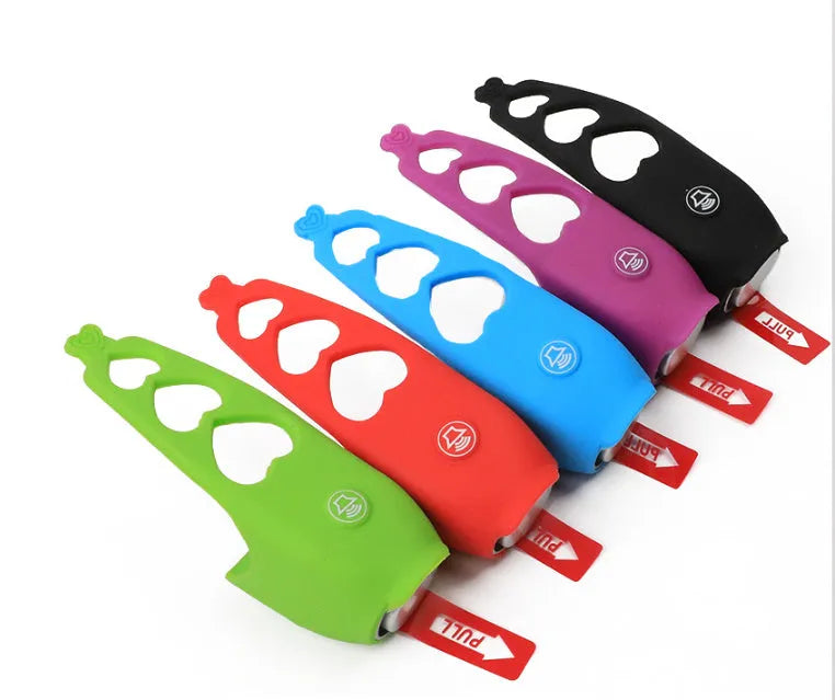 Electronic bicycle horn in six colour options showing compact plastic design for handlebar mounting