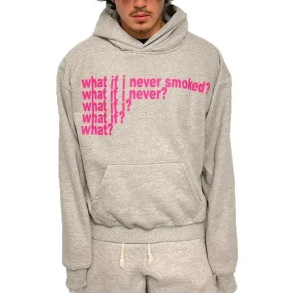 Black hooded pullover sweater with a large letter print on the front, shown on a model.