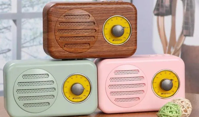 Portable Bluetooth wireless speaker with FM radio in wood grain finish