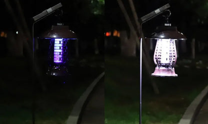 White and black solar-powered electronic mosquito lamp for garden outdoor insect control.