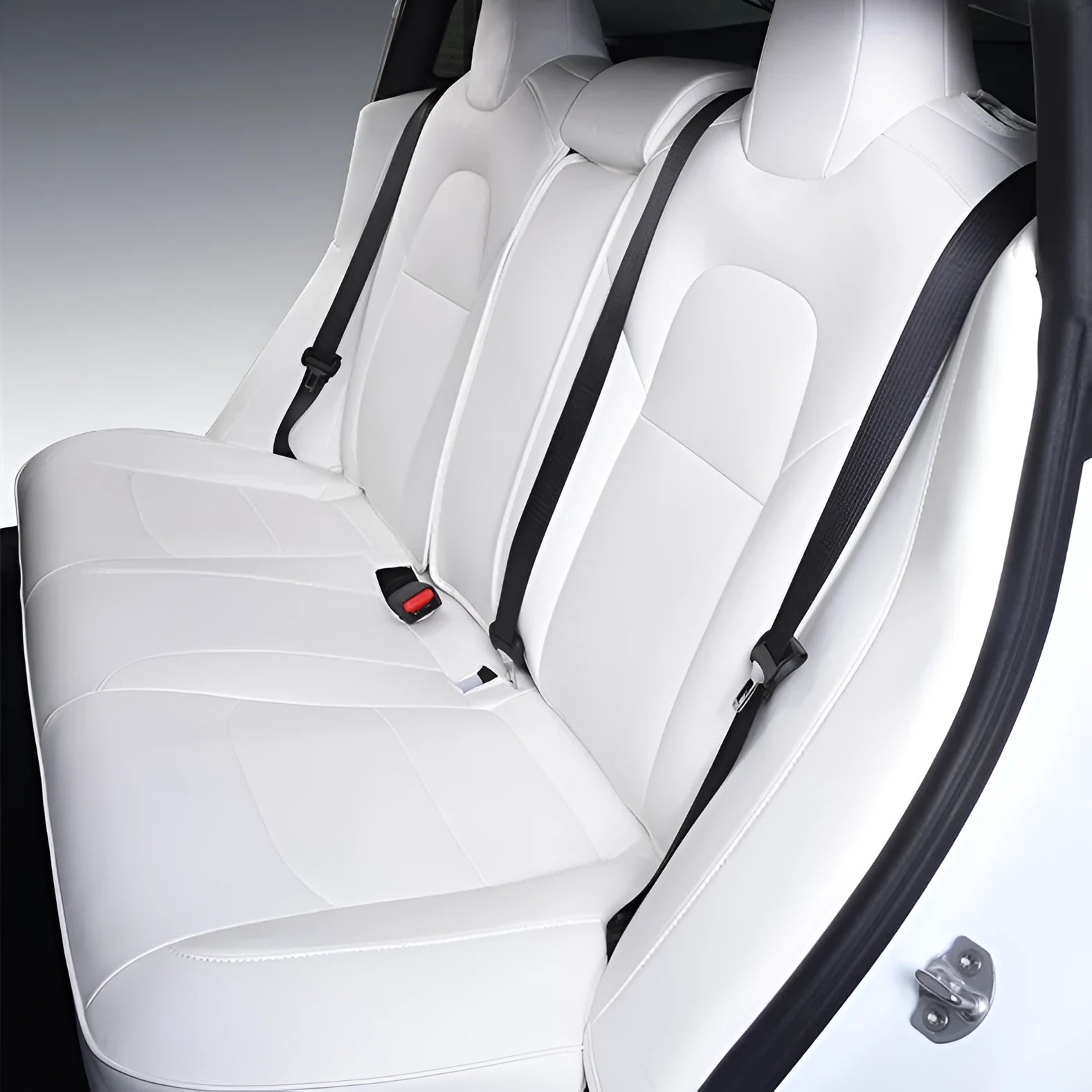 Black PVC seat cover installed on a Tesla Model 3 front seat, showing binding-style edges.