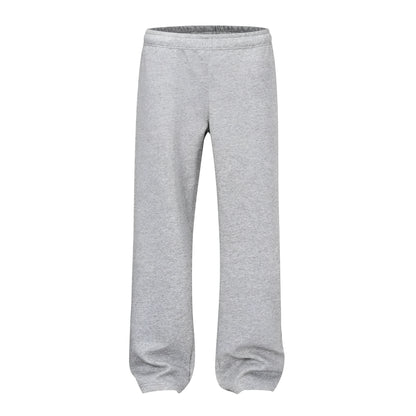 Men's straight-leg grey cotton casual trousers with an elasticated waistband laid flat.