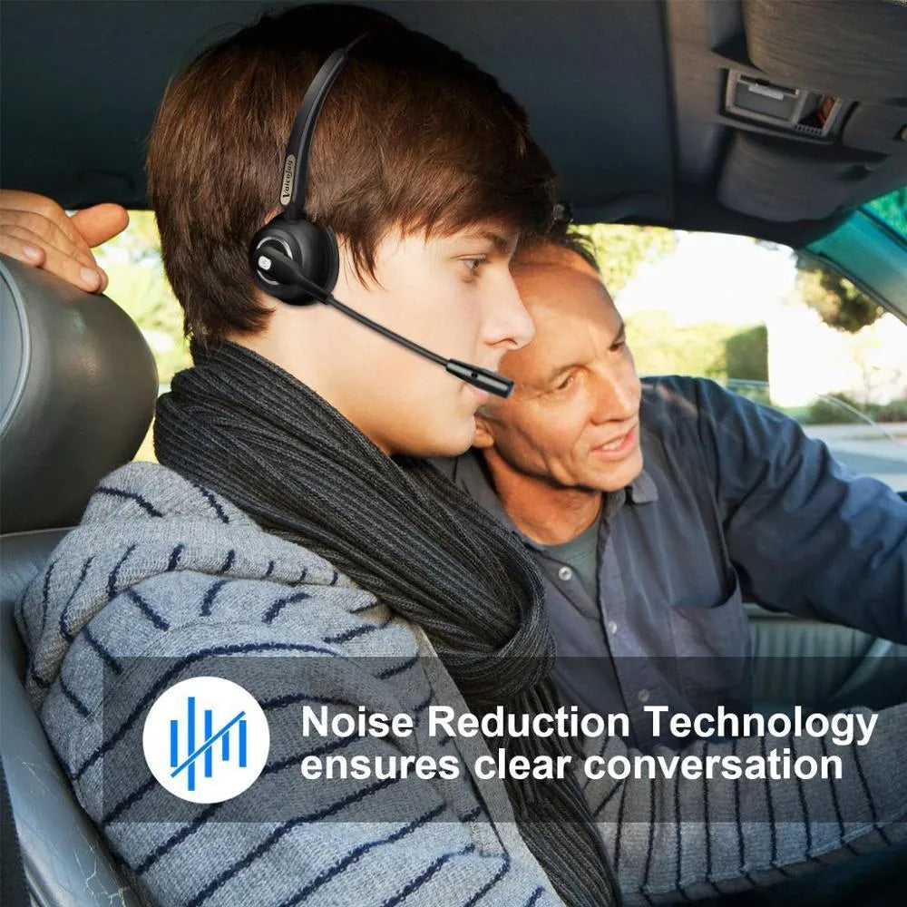 Over-ear Bluetooth headset with microphone for truck drivers and office use, shown with a USB charging cable.