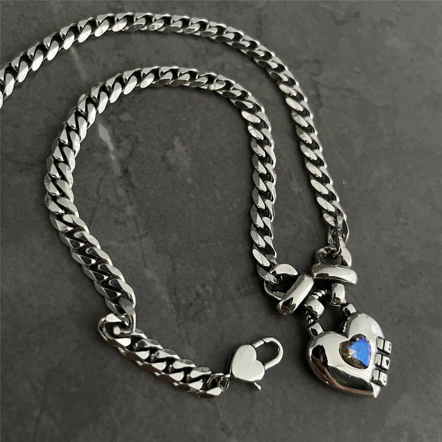 Heart Sweater Necklace with geometric design and Thai silver plated finish