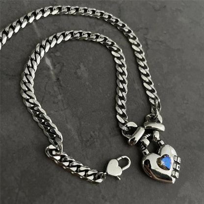Heart Sweater Necklace with geometric design and Thai silver plated finish