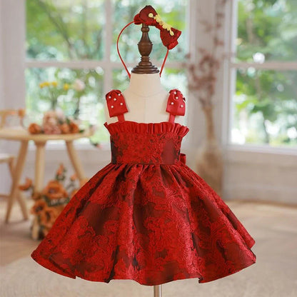 Red princess-style braces skirt for girls with adjustable straps on hanger