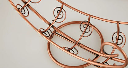 Stainless steel wine rack measuring 320mm wide with wine bottle storage