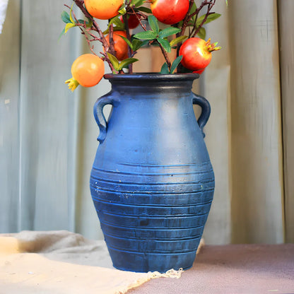 Ceramic mosaic vase with dried flowers, showing mosaic pattern and 25cm height