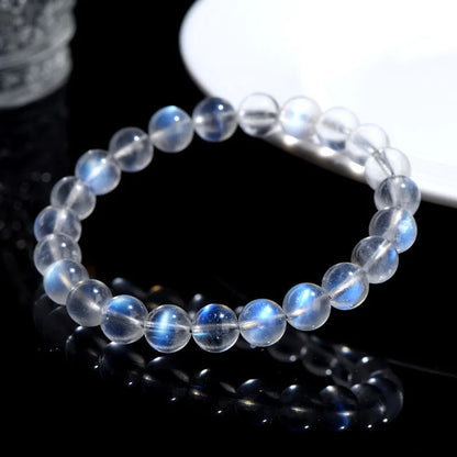 Natural cream body blue moonlight crystal bracelet with grinding texture, unisex design, sizes 4mm to 10mm