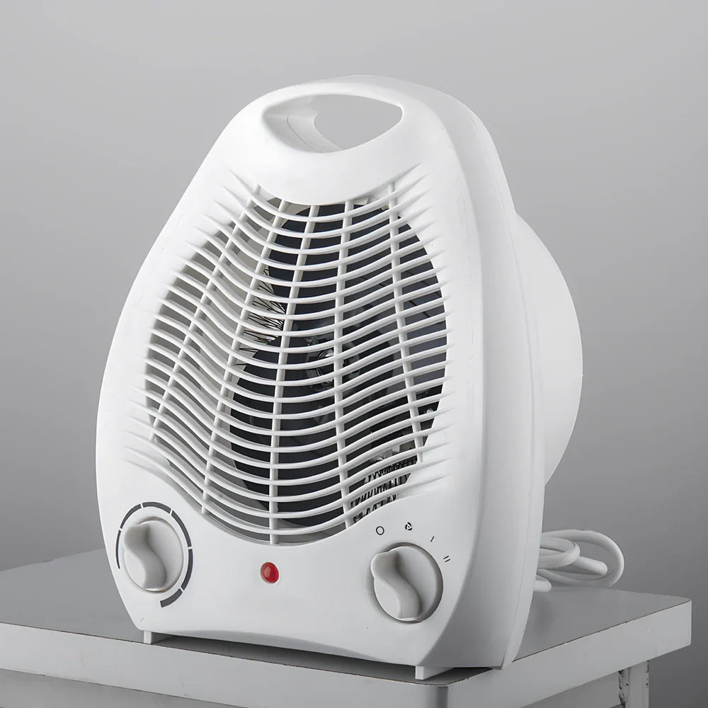 White compact electric heater with mechanical control knob for three-speed operation