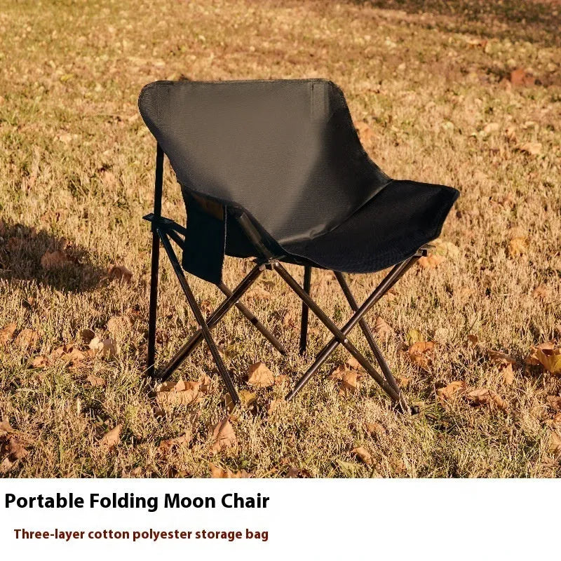 Portable folding camping chair with steel frame and Oxford fabric in outdoor setting