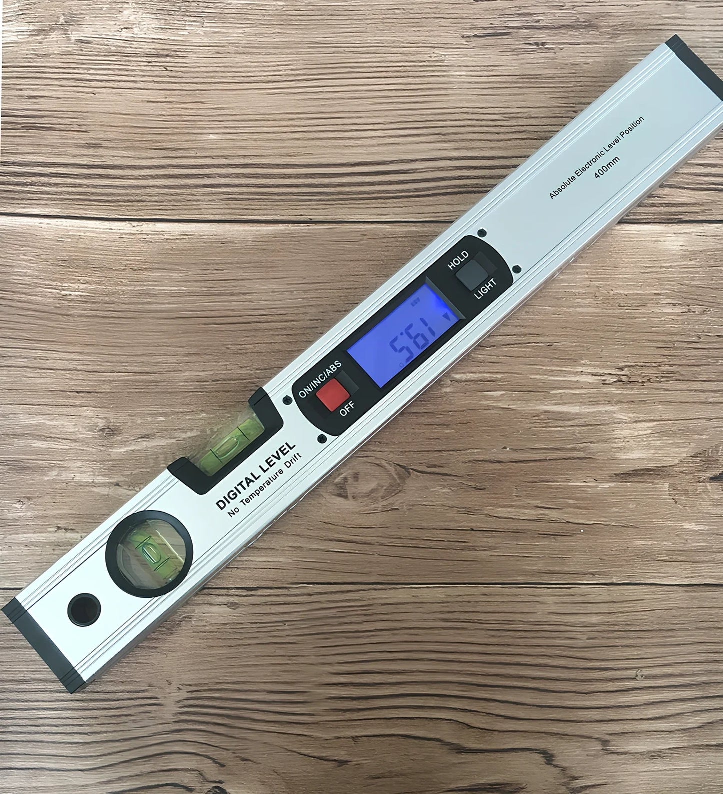 Magnetic digital angle meter with LCD display showing degree measurement on metal surface