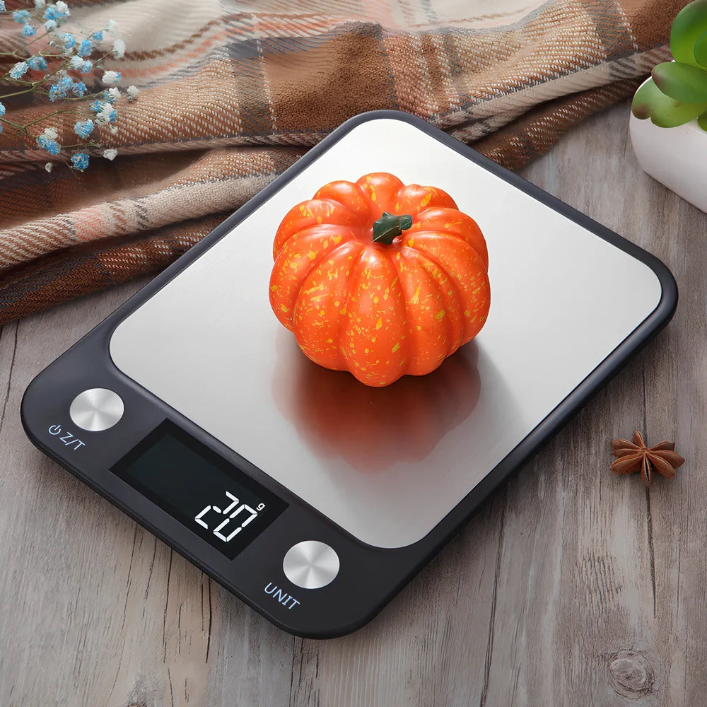 Stainless steel digital kitchen scale with LCD display showing weight measurement