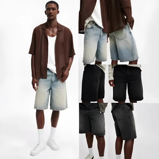 Men's light blue loose-fit straight-leg cotton jeans on a neutral background.