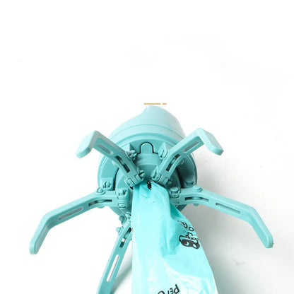 Blue portable plastic dog pooper scooper with eight-claw shovel and built-in bag dispenser
