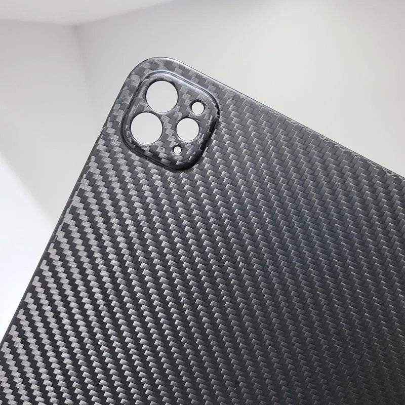 Carbon fibre protective cover for iPad Pro 11 showing 3K matte fine hole texture and embossed plaid pattern
