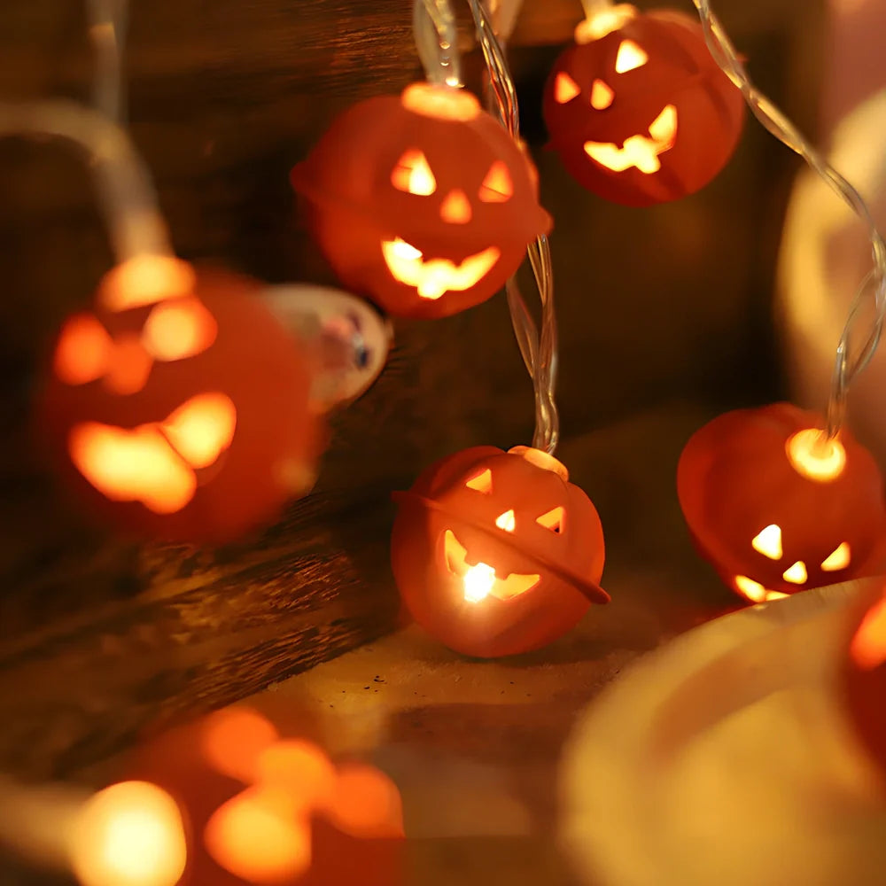 Halloween pumpkin string lights with iron shells, warm white illumination, battery operation
