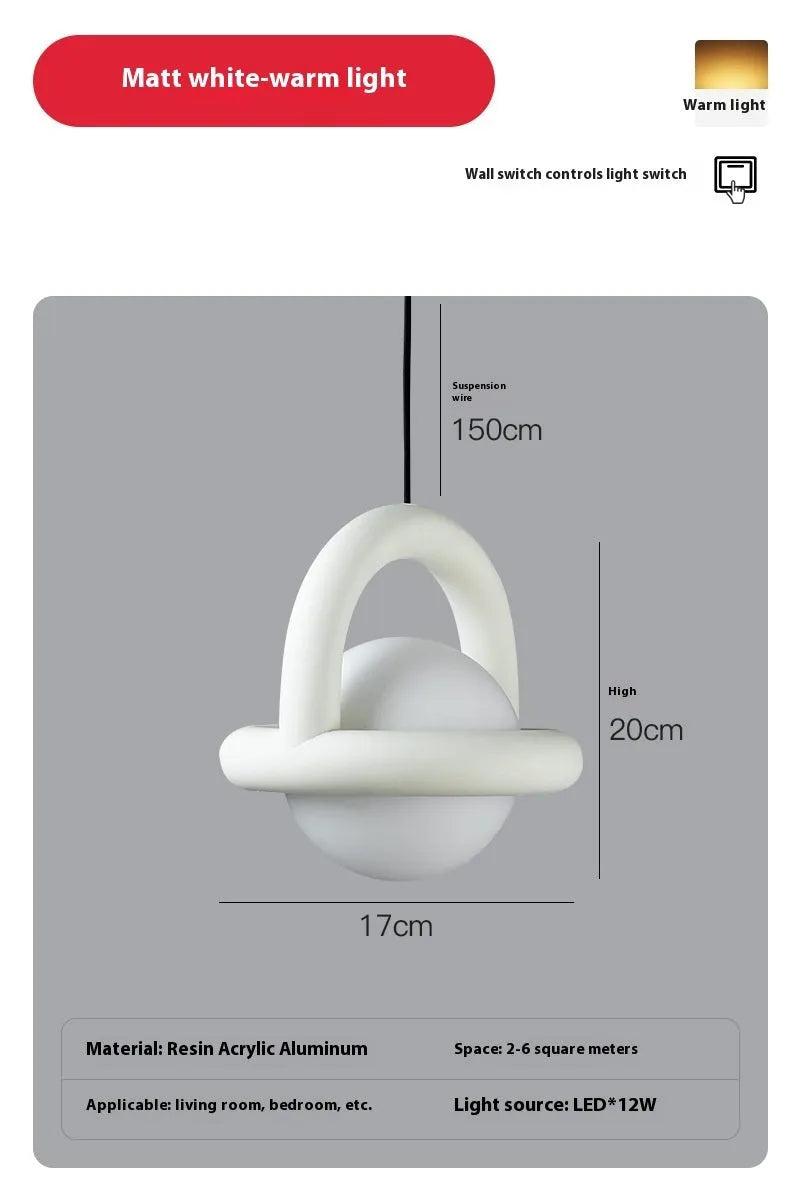 Danish designer hanging line lamp with adjustable cord and matte finish in bedside setting
