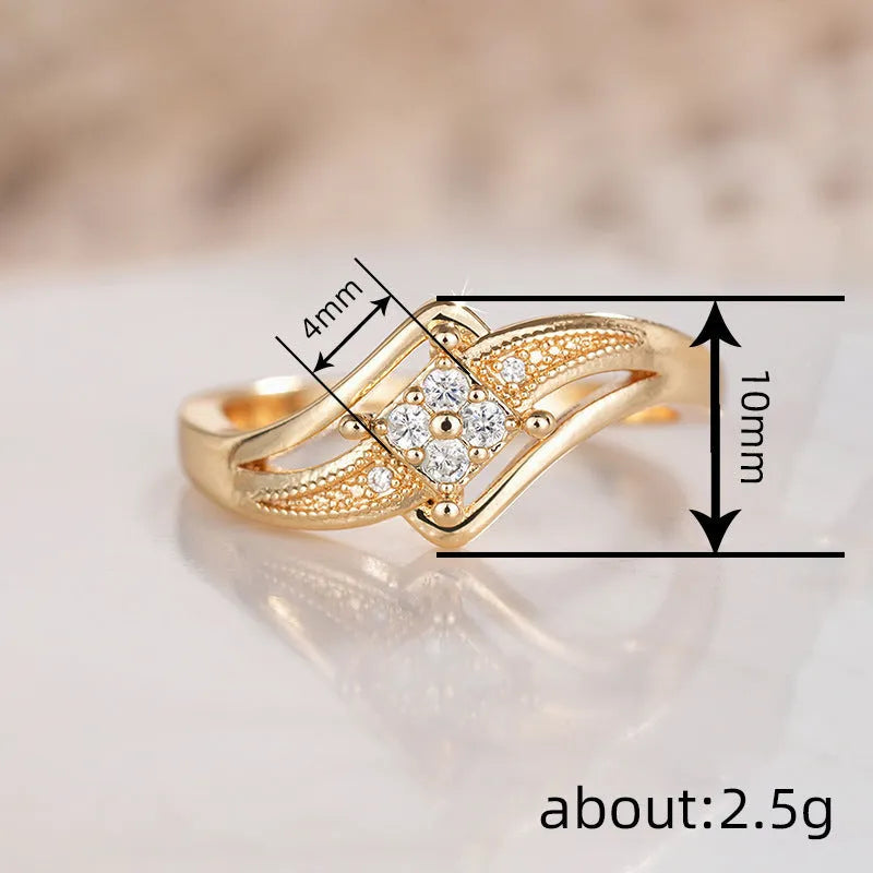 Yellow gold coloured copper diamond ring with micro inlaid zircon geometric ornamentation.