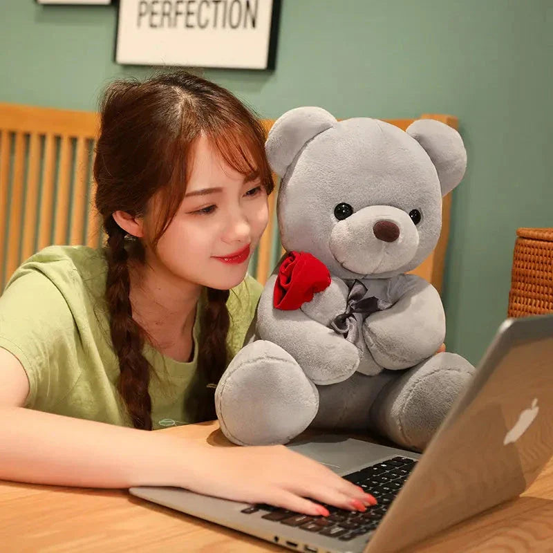 Soft, plush teddy bear-shaped pillow in brown, beige, and grey colors, perfect for cuddling and relaxation