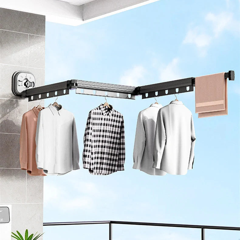 Aluminum retractable drying rack mounted on a window, extending outward for clothes drying