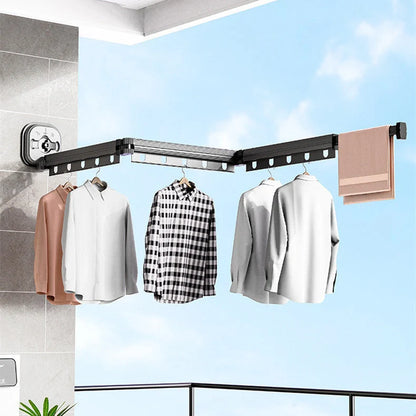Aluminum retractable drying rack mounted on a window, extending outward for clothes drying