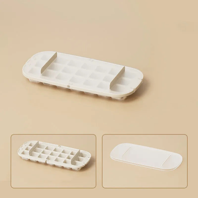Yellow and blue food grade plastic ice cube trays with ice shovel stored in dedicated slot