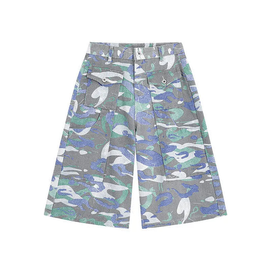 Denim workwear trousers with camouflage colour pattern, straight-leg cut, and zipper fly