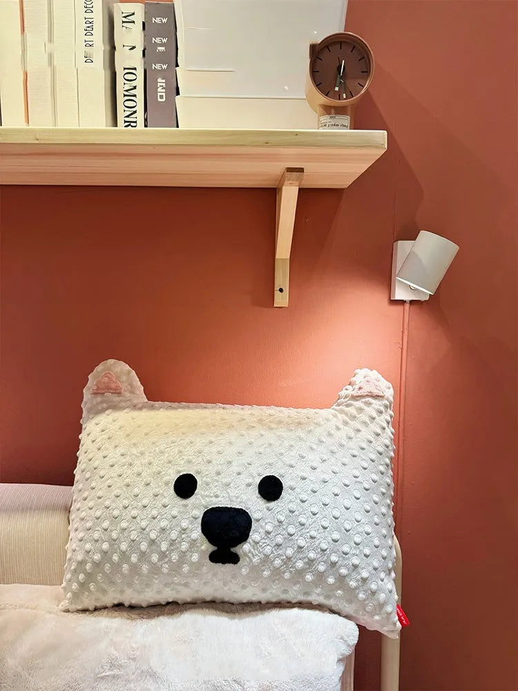 Grey schnauzer print dog pillow cushion on a sofa, measuring 50cm long.