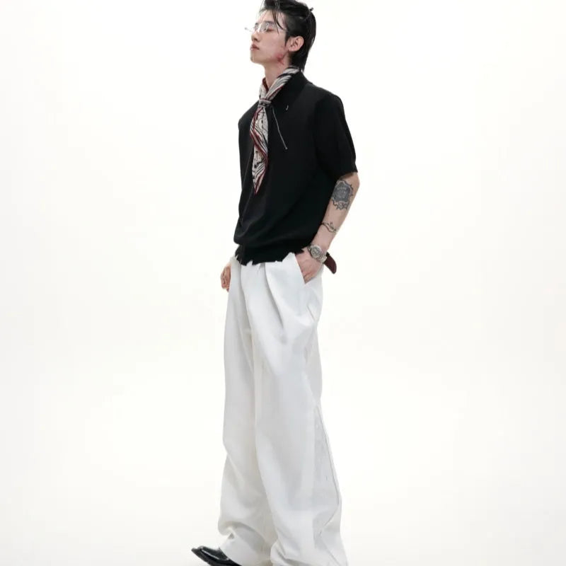 Men's slim-fit black knitted polo shirt with an oblique diagonal zipper and short sleeves.
