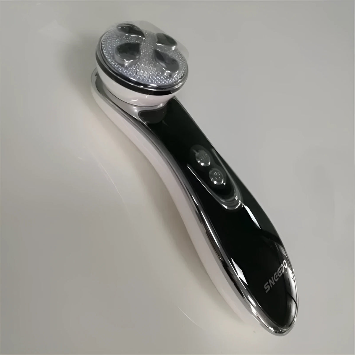Vibration beauty instrument with medical anti-allergy steel probe, RF EMS sonic vibration and colour light, in rose gold or white