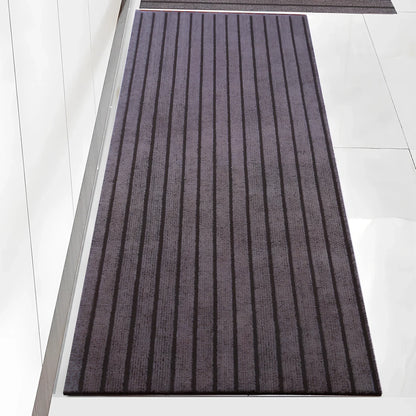 PVC kitchen floor mat with seven-stripe design in camel colour showing machine-woven texture
