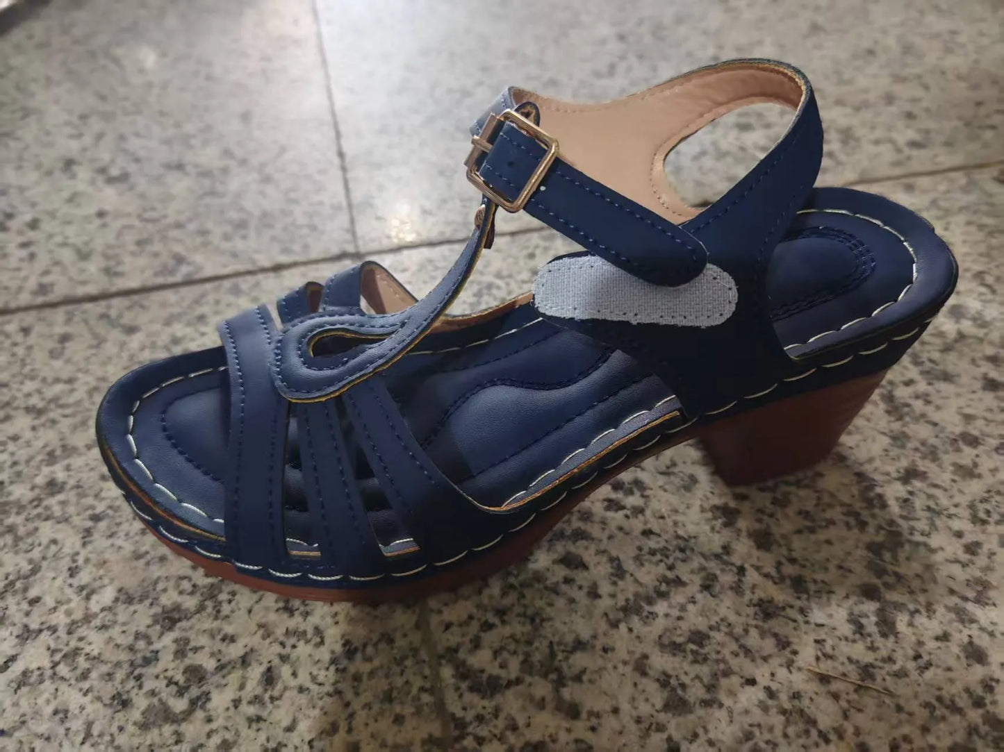 Women's black peep toe wedge platform sandals showing fish mouth toe design and ankle buckle strap