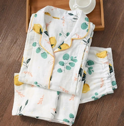 Traditional maternity pajama set with 100% cotton batik fabric, ankle-length trousers, and full-length bell sleeves