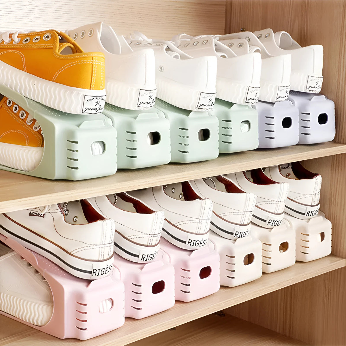 Stackable plastic shoe rack organizer in black, adjustable double shelf storage for entryway or closet.