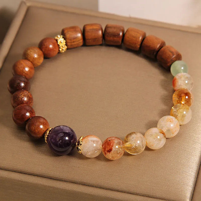 Women's yellow tower crystal and ebony amethyst bracelet with pearl rhinestone sequin accents