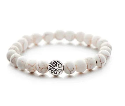 Handcrafted natural stone bracelet with alloy volcano white turquoise charm in a simple design.