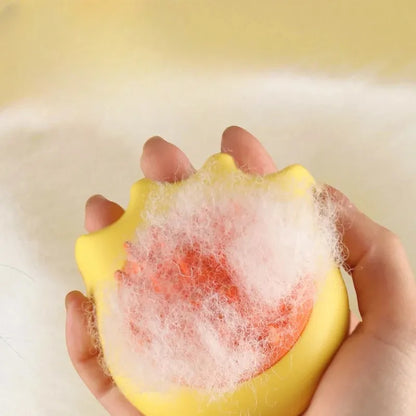 Pet bath brush with built-in shampoo box showing four brush types for dog and cat grooming
