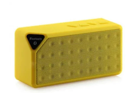 Cannon X3 small cube-shaped wireless Bluetooth speaker in five colour options on a plain background.