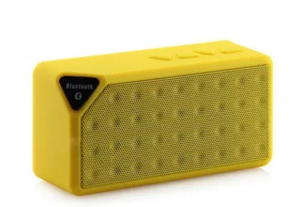 Cannon X3 small cube-shaped wireless Bluetooth speaker in five colour options on a plain background.